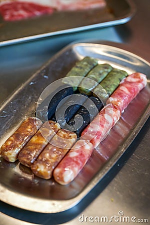 Four flavors of Chinese sausages Stock Photo
