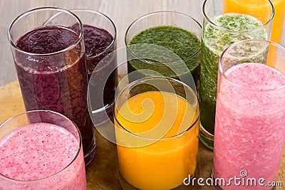 Four fruit, berry and vegetables healthy smoothies Stock Photo