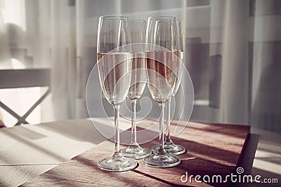 four glasses of French champagne, on the table Stock Photo