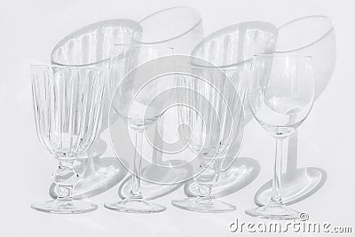 Four glasses on a white background. Stock Photo