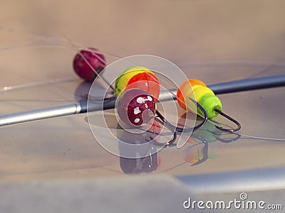 Four good colorful floats with hooks for fishing Stock Photo