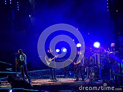 Four Members of Band Coldplay on Stage in Concert Editorial Stock Photo