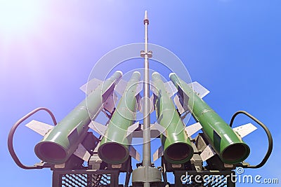 Four missiles of self-propelled system Buk M2 on blue sky background Editorial Stock Photo