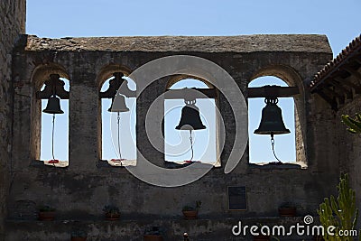 Four mission bells at the mission Stock Photo