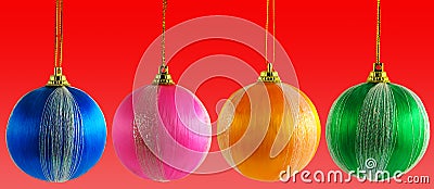 Four multicolored Christmas balls Stock Photo