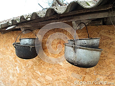 Four old cauldrons Stock Photo