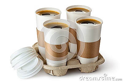 Four opened take-out coffee in holder Stock Photo