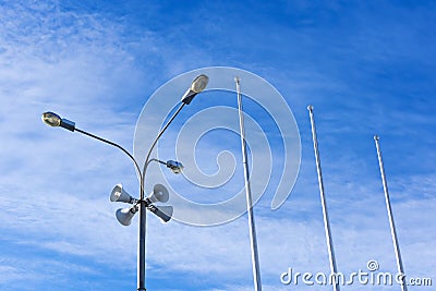 Four outdoor megaphones on one street light Stock Photo