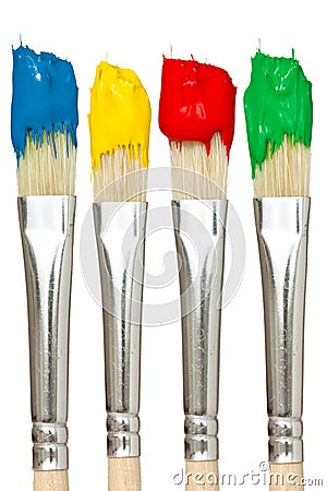 Four paintbrushes with color paints Stock Photo