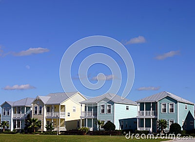 Four pastel houses in a row Stock Photo