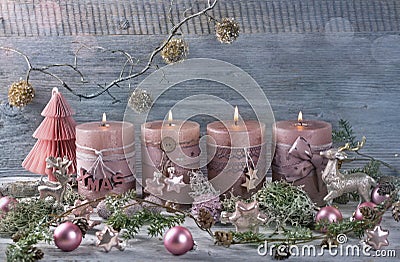 Four pink christmas candle Stock Photo