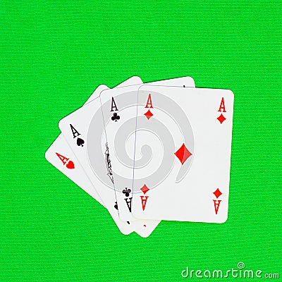 Four playing cards depicting aces Stock Photo