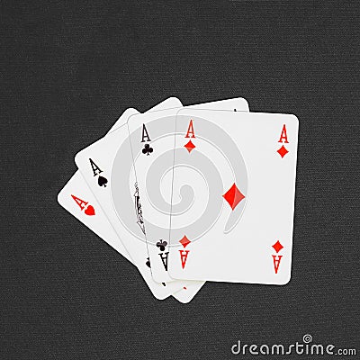 Four playing cards depicting aces Stock Photo