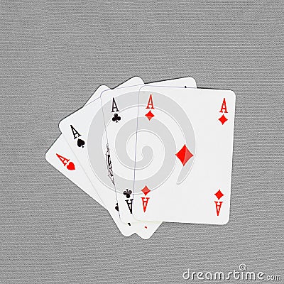 Four playing cards depicting aces Stock Photo