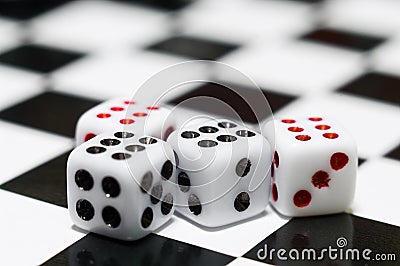 Four playing dices Stock Photo