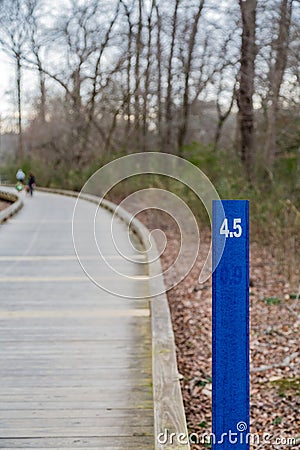 Four Point Five Mile Marker on Fitness Trail Stock Photo