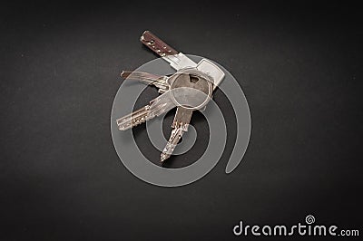Four security keys arranged into a still life. All keys are bent due to incorrect handling. Stock Photo