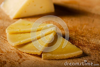 Four Slices of Spanish Manchego Cheese Stock Photo