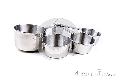 Four stainless steel measuring cups clipped together Stock Photo