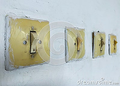 Vintage switch and switch on the wall. Stock Photo