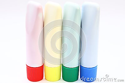 Four tubes of color paints Stock Photo