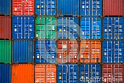 Four vertical rows of shipping containers Stock Photo