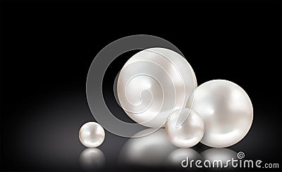 Four white pearls on black background Stock Photo