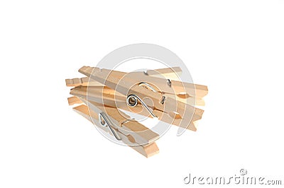 Four wooden clothespins Stock Photo