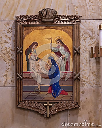 The fourteenth of the Fourteen Stations of the Cross inside Christ the King Church in Dallas, Texas. Editorial Stock Photo