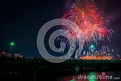 Fourth of July fireworks over the Broad Canal at night, in Cambridge, Massachusetts. Editorial Stock Photo