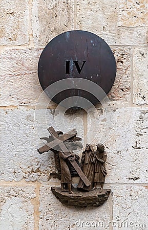 The fourth station of the Cross Procession on the wall in Lions Gate Street near the Lions Gate in the old city of Jerusalem, in Editorial Stock Photo