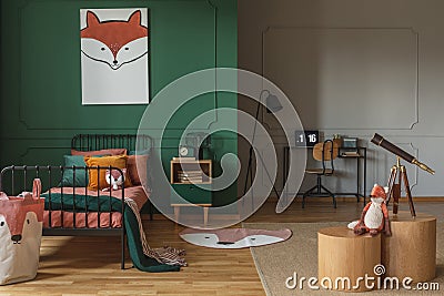 Fox head on vertical poster in emerald green teenager bedroom Stock Photo