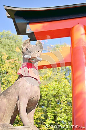 Fox statue at Fushimi Inari shrine in Kyoto Stock Photo