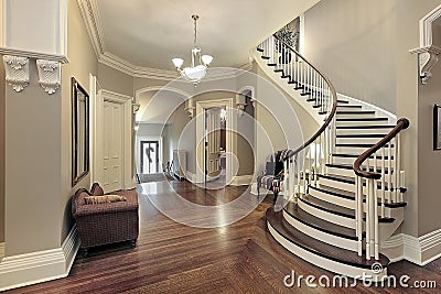 Foyer with curved staircase Stock Photo