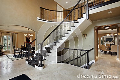 Foyer with curved staircase Stock Photo