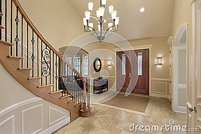 Foyer with curved staircase Stock Photo