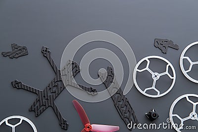 FPV drone with your own hands. Drone FPV frame. Spare parts for FPV drone made of carbon. Stock Photo