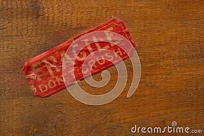 Fragile Label on Wood Stock Photo