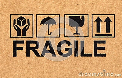 Fragile symbol on cardboard Stock Photo