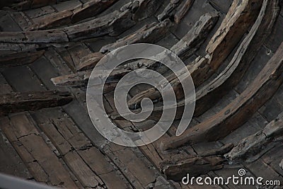 A fragment of an ancient ship, boats in the Viking Museum in Roskilde, Denmark Stock Photo