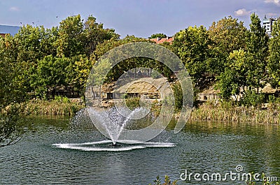 Fragment of artificial pond and fountain with beauty drops Stock Photo