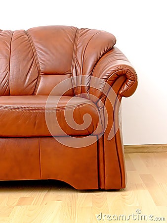 Fragment of brown sofa Stock Photo