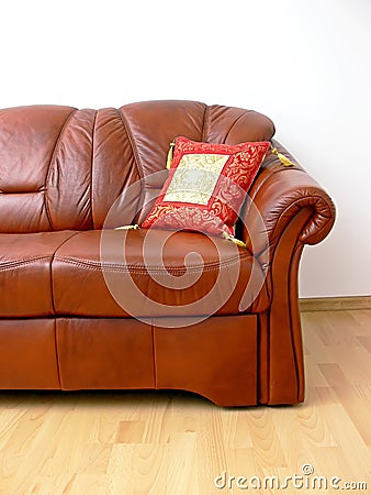 Fragment of brown sofa Stock Photo