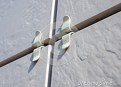 Fragment of a building cladding with ceramic tiles Stock Photo