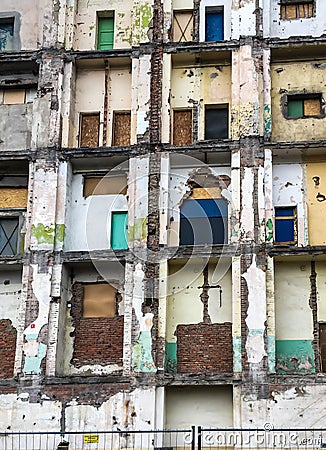 A fragment of a building with a demolished external wall Stock Photo