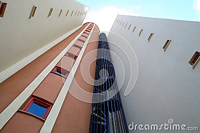 A fragment of a building with a spiral staircase Stock Photo