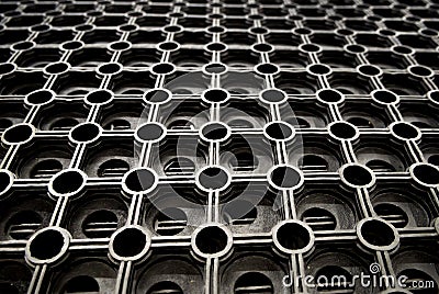 Fragment of cellular rubber mat for dirt removal Stock Photo