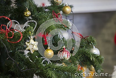 Fragment of a Christmas tree with toys.Christmas background Stock Photo