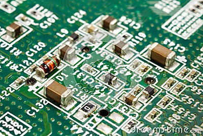 Fragment of the circuit board with electronic components Stock Photo