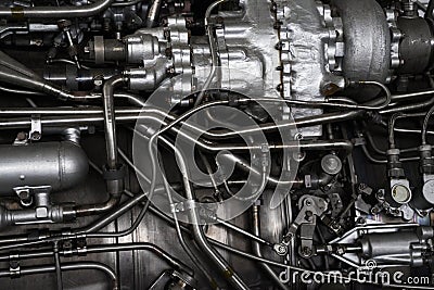 Fragment of a complex mechanical aggregate with various communication and control organs. Stock Photo